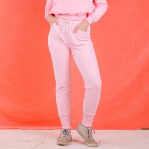 Baby pink big bud press sweats in xs